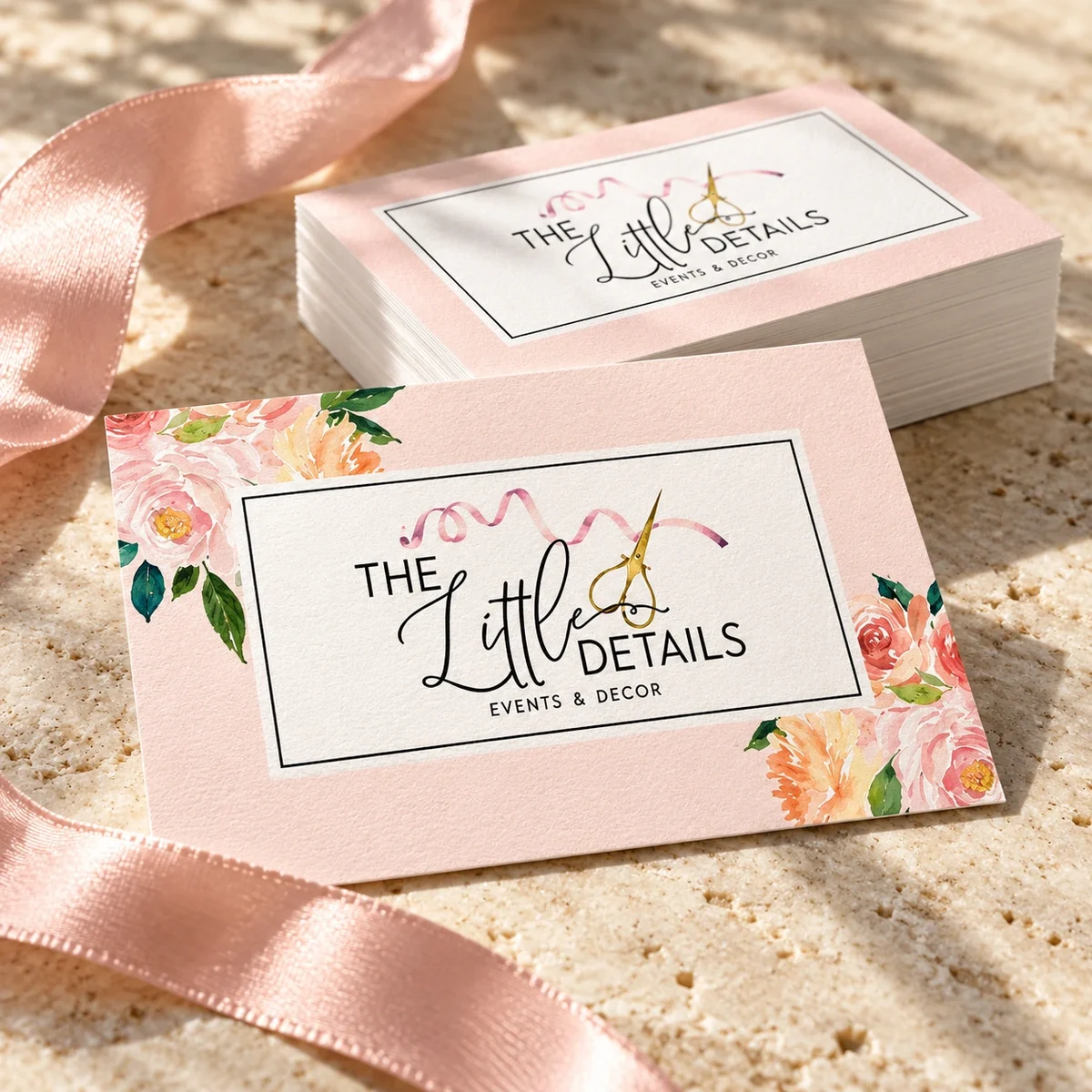 Blush pink floral business cards for The Little Details with ribbon